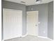 Bedroom with gray walls and carpet at 6410 Cypressdale Dr # 201, Riverview, FL 33578