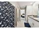 Double vanity bathroom with shower and bedroom view at 3172 Lytton Hall Dr, Zephyrhills, FL 33540