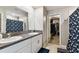 Double vanity bathroom with walk-in closet and shower at 3172 Lytton Hall Dr, Zephyrhills, FL 33540