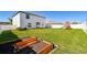 Backyard with playset and raised garden beds at 3172 Lytton Hall Dr, Zephyrhills, FL 33540