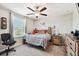 Bedroom with ceiling fan, window, and dresser at 3172 Lytton Hall Dr, Zephyrhills, FL 33540