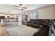 Open concept living and kitchen area with wood flooring at 3172 Lytton Hall Dr, Zephyrhills, FL 33540