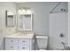 Clean bathroom with white tile and a vanity at 9481 Highland Oak Dr # 1615, Tampa, FL 33647