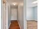 Bright entryway with wood-look flooring and neutral walls at 9481 Highland Oak Dr # 1615, Tampa, FL 33647