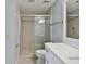 Updated bathroom with a walk-in shower, toilet and vanity at 9481 Highland Oak Dr # 1615, Tampa, FL 33647