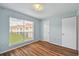 Bedroom with a large window overlooking a courtyard at 9481 Highland Oak Dr # 1615, Tampa, FL 33647