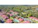 Aerial view of condo community with pool and lush landscaping at 9481 Highland Oak Dr # 1615, Tampa, FL 33647