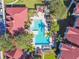 Overhead view of refreshing community pool and surrounding patio at 9481 Highland Oak Dr # 1615, Tampa, FL 33647
