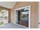 Balcony with sliding glass doors leading to the interior at 9481 Highland Oak Dr # 1615, Tampa, FL 33647