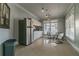 Community kitchen with appliances and a small table at 9481 Highland Oak Dr # 1615, Tampa, FL 33647