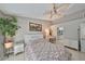 Main bedroom with a king-size bed, and access to the bathroom at 17721 Ridgeway Point Pl, Tampa, FL 33647