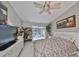 Main bedroom with a comfortable bed, large TV and lots of closet space at 17721 Ridgeway Point Pl, Tampa, FL 33647