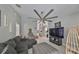 Spacious living room with a large sectional sofa and flat-screen TV at 17721 Ridgeway Point Pl, Tampa, FL 33647