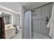 Bathroom with shower/tub combo, vanity, and a toilet at 17721 Ridgeway Point Pl, Tampa, FL 33647