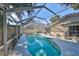 Refreshing rectangular pool with screened enclosure at 17721 Ridgeway Point Pl, Tampa, FL 33647