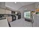 Bright kitchen features updated appliances and ample cabinetry at 17721 Ridgeway Point Pl, Tampa, FL 33647