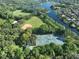 Aerial view of community amenities: tennis courts, baseball field at 17721 Ridgeway Point Pl, Tampa, FL 33647