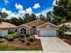 Charming single-Gathering home with two-car garage and well-manicured lawn at 5417 83Rd E Ter, Sarasota, FL 34243