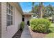 Sidewalk with landscaping and grill at 1015 Radison Lake Ct # 65, Sun City Center, FL 33573