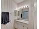 Clean bathroom with a vanity and double mirrors at 1015 Radison Lake Ct # 65, Sun City Center, FL 33573