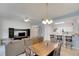 Open living and dining area with a view to the backyard at 1015 Radison Lake Ct # 65, Sun City Center, FL 33573