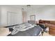 Bedroom with a comfortable bed and built-in desk at 1015 Radison Lake Ct # 65, Sun City Center, FL 33573