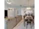 Spacious living area with an open floor plan including the kitchen and dining areas at 1015 Radison Lake Ct # 65, Sun City Center, FL 33573