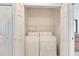 Convenient laundry closet with washer and dryer at 1015 Radison Lake Ct # 65, Sun City Center, FL 33573