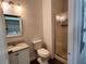 Small bathroom with shower and granite vanity at 11074 Winter Crest Dr, Riverview, FL 33569