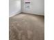 Neutral carpeted bedroom featuring a window that allows for plenty of natural lighting at 13292 Sea Bridge Dr, Hudson, FL 34669