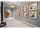 Hallway with modern art installations and marble flooring at 2910 W Barcelona St # 1001, Tampa, FL 33629