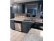 Modern kitchen with stainless steel appliances and ample counter space at 6115 7Th Ave, New Port Richey, FL 34653