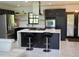 Modern kitchen with stainless steel appliances and a large island at 26638 Green Willow Run, Wesley Chapel, FL 33544