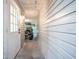 Side entry with golf cart and white walls at 1837 Worrington St, Sarasota, FL 34231