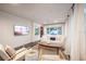 Bright living room features a comfortable sofa and stylish coffee table at 1837 Worrington St, Sarasota, FL 34231