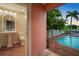 Inviting pool area with brick patio at 825 Islebay Dr, Apollo Beach, FL 33572