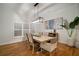 Bright dining room featuring a large art piece above a wine cabinet at 825 Islebay Dr, Apollo Beach, FL 33572