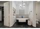 Bathroom with freestanding tub and walk-in shower at 825 Islebay Dr, Apollo Beach, FL 33572
