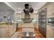Well-equipped kitchen with granite countertops and stainless steel appliances at 825 Islebay Dr, Apollo Beach, FL 33572