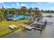 Aerial view of community pool, dock, and boats at 825 Islebay Dr, Apollo Beach, FL 33572