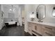 Elegant bathroom featuring a soaking tub and modern vanity at 825 Islebay Dr, Apollo Beach, FL 33572