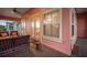 Screened balcony with seating and access to interior at 825 Islebay Dr, Apollo Beach, FL 33572
