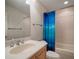 Clean bathroom with tub, shower, and updated vanity at 825 Islebay Dr, Apollo Beach, FL 33572