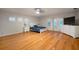 Spacious main bedroom with hardwood floors and French doors at 825 Islebay Dr, Apollo Beach, FL 33572