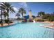 Resort-style pool with waterslide and lighthouse feature at 825 Islebay Dr, Apollo Beach, FL 33572