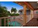 Pool deck with view of canal and lush landscaping at 825 Islebay Dr, Apollo Beach, FL 33572
