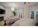 Main bedroom with sitting area and fireplace at 825 Islebay Dr, Apollo Beach, FL 33572