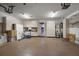 Garage with ample storage and workbench at 825 Islebay Dr, Apollo Beach, FL 33572