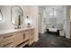 Spa-like bathroom with a freestanding tub and updated fixtures at 825 Islebay Dr, Apollo Beach, FL 33572