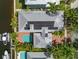 Top-down view of a home showcasing solar panels and a pool at 825 Islebay Dr, Apollo Beach, FL 33572